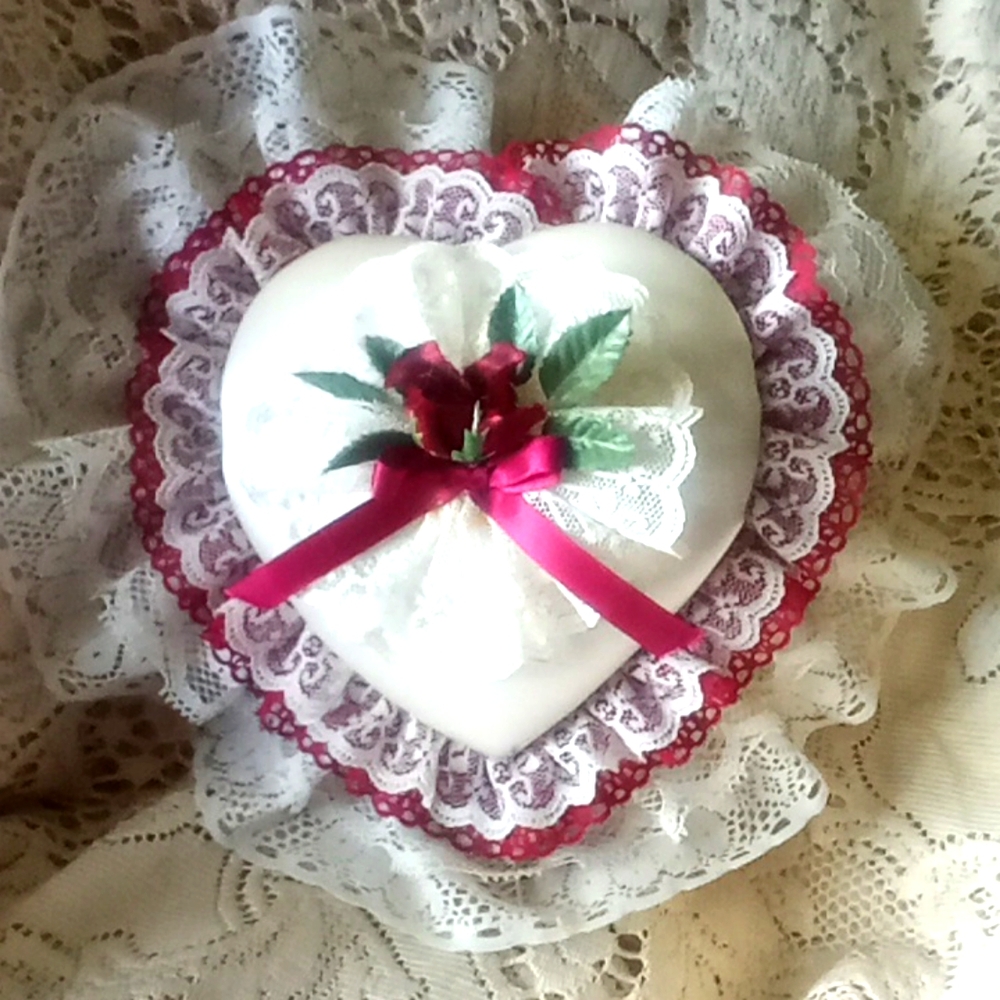 Vintage Yap's Hong Kong clear plastic music box with beautiful heart top.